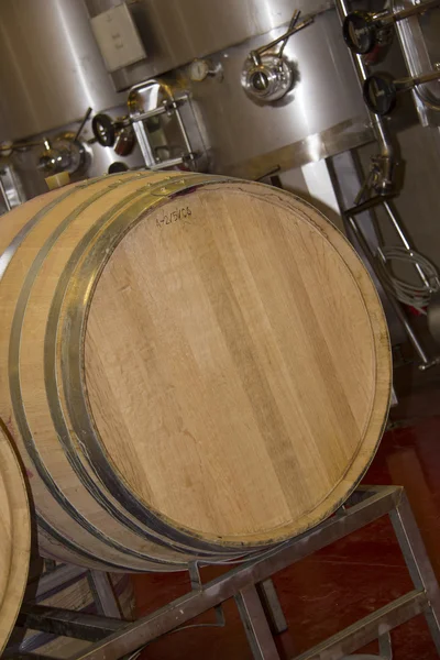 Wine making vats and wooden barrels in the cellar