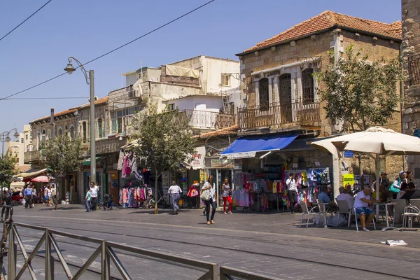 People crossing the intersection of always busy streets of downtown Jerusalem during Friday preparation for the Evevning of Shabbat.Jerusalem