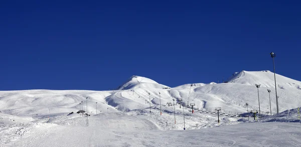 Panoramic view on ski resort at sun day