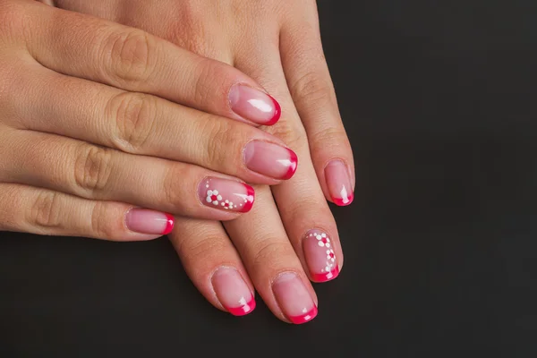 Red french nail art with flower