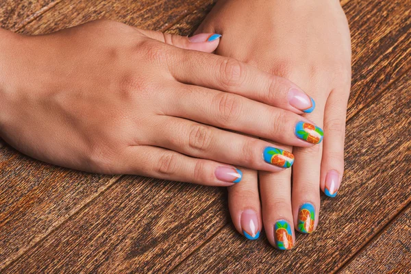 Summer french blue nail art with painted orange fruit