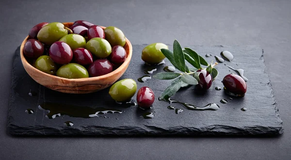 Olives on a graphite board