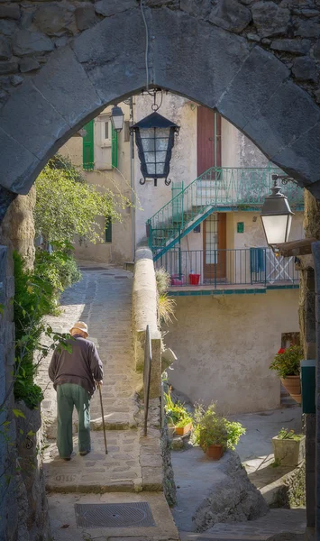 Man in street of old village