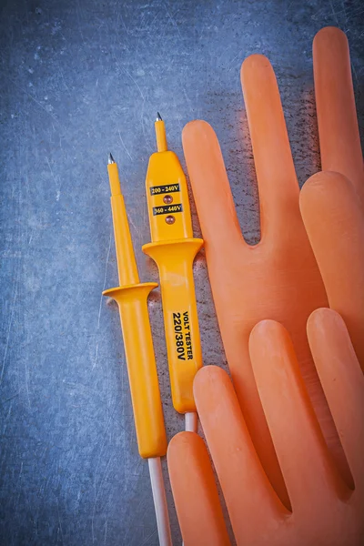 Insulating gloves and electric tester
