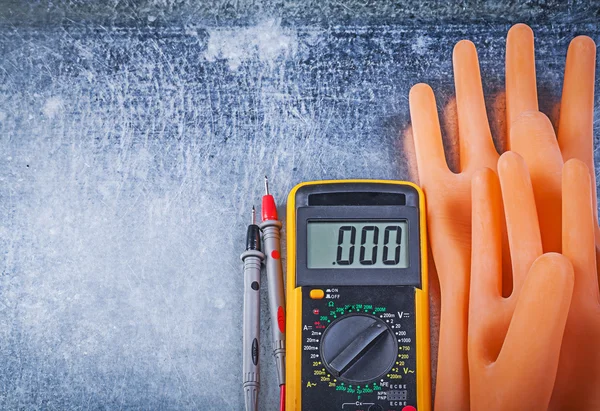 Digital multimeter and dielectric rubber gloves