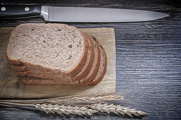 Rye wheat ears and sliced bread