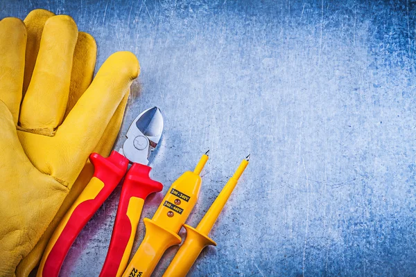 Electrical tester, safety gloves and nippers