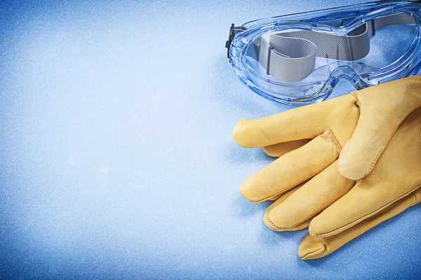 Leather safety gloves and goggles