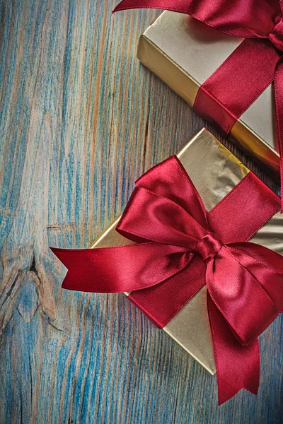 Boxed gifts in golden wrapping paper