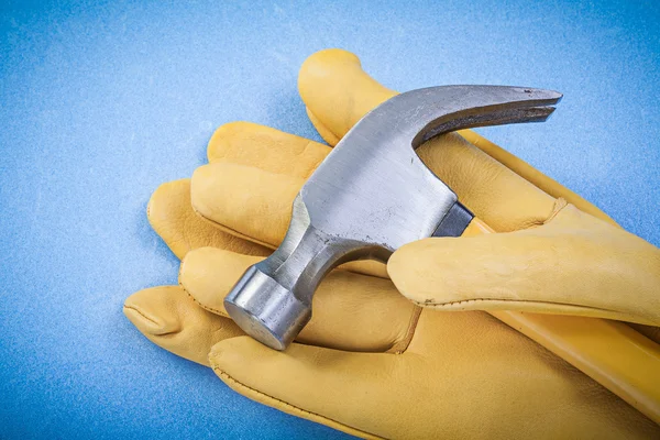Claw hammer and pair of protective gloves