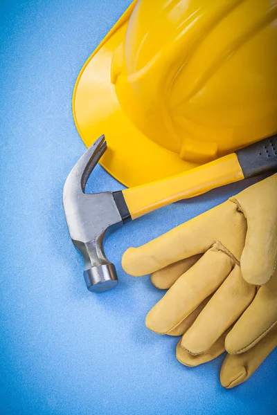 Claw hammer and safety gloves