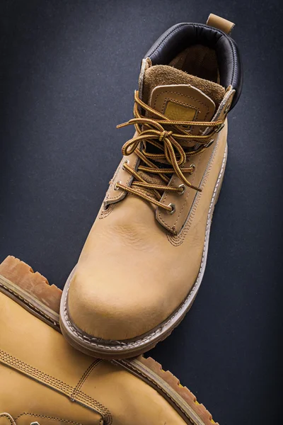 Working boots on background