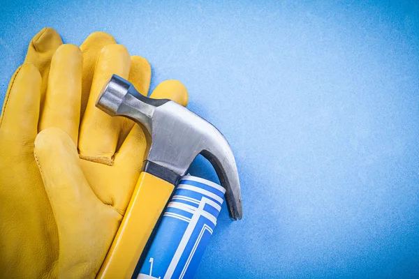 Claw hammer on blue background