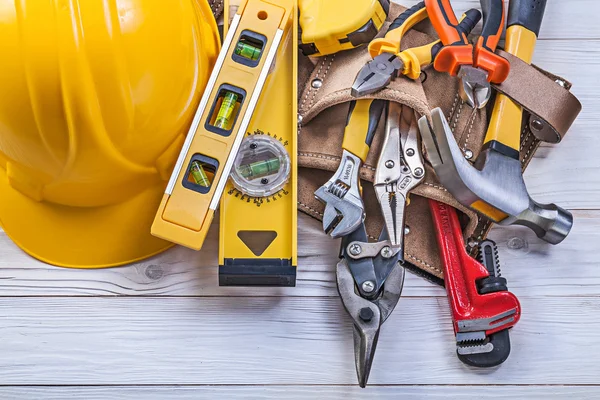 Construction tools, tool belt and helmet