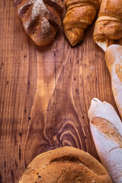 Bread on wooden background
