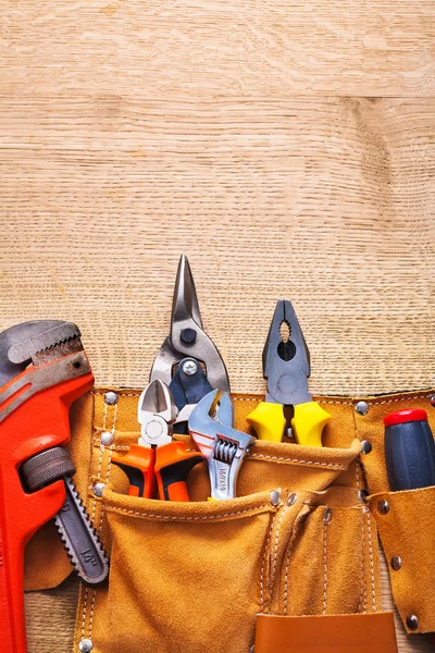 Construction tools in tool belt