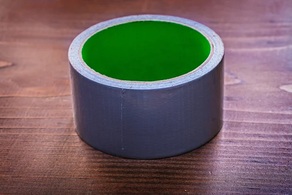 Duct tape on wooden board