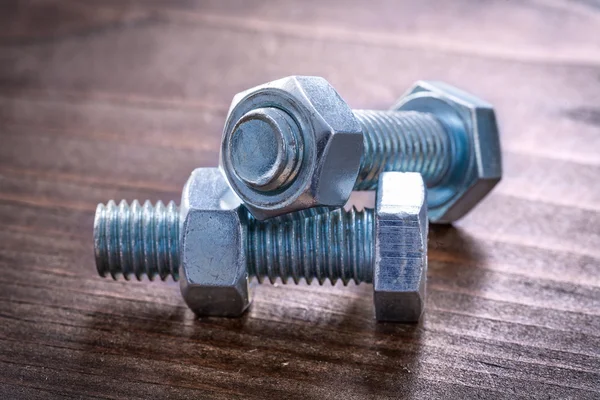 Metal threaded bolts and nuts