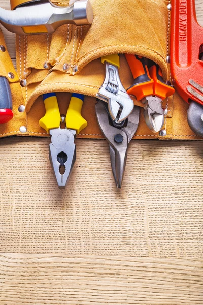 Construction tools in toolbelt