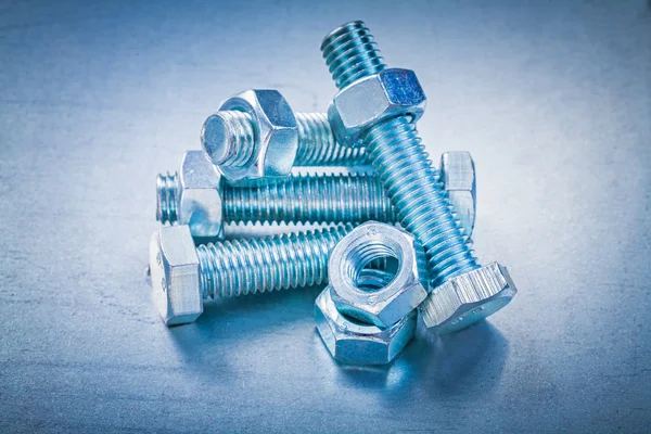 Group of metal screw nuts and bolts