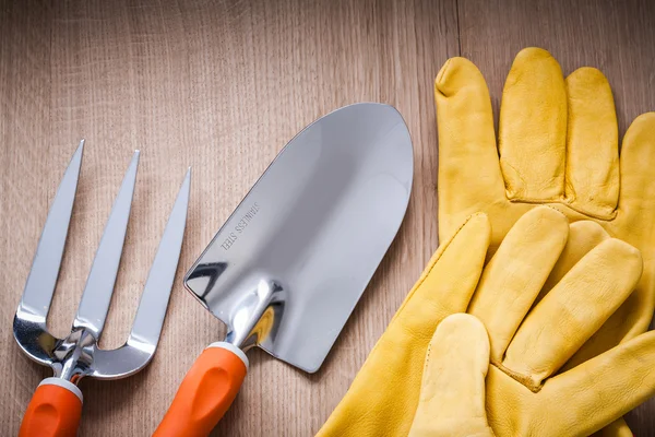 Metal hand spade, trowel fork and gloves