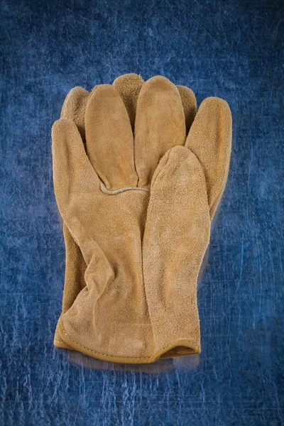 Pair of leather brown working gloves