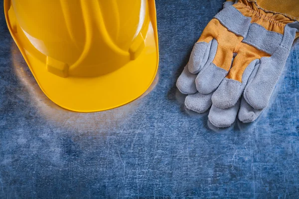 Building helmet and protective working gloves