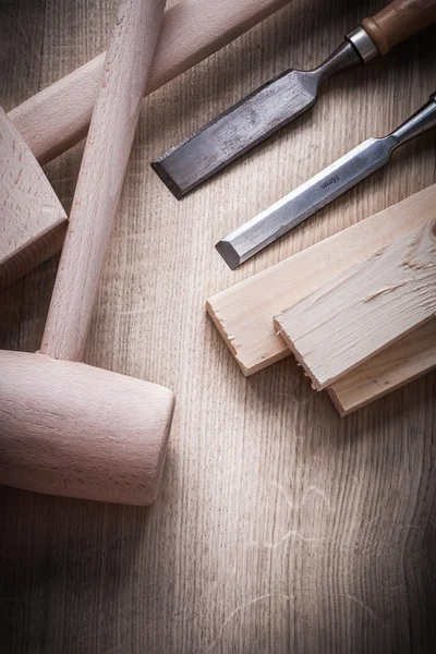 Wooden building boards, hammers, chisels