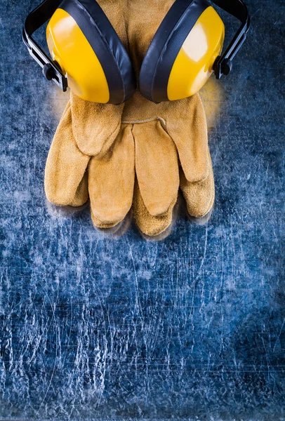 Leather safety gloves and ear muffs