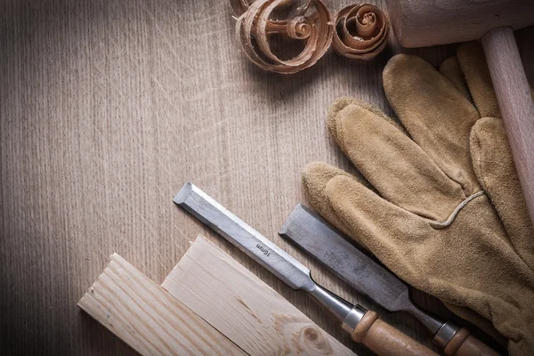 Wooden boards, mallet , leather gloves