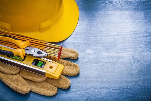 Wooden meter and protective gloves