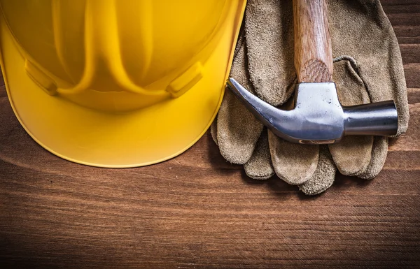 Claw hammer, hard hat and gloves