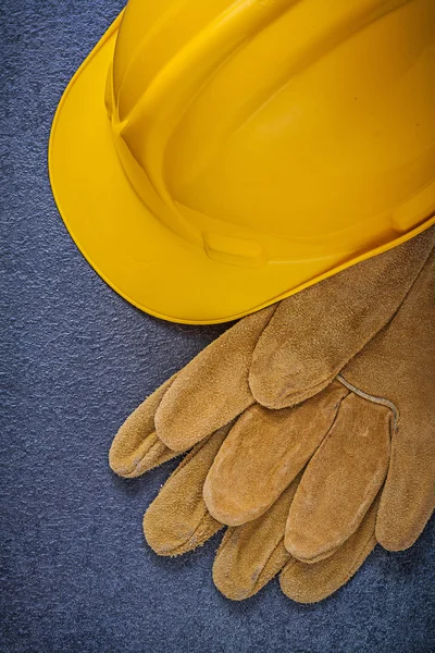 Safety hard hat and leather gloves