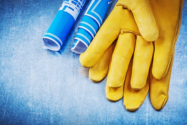 Safety gloves and construction drawings