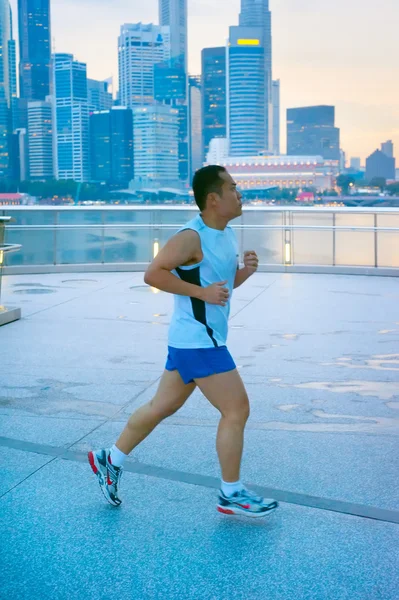 Unidentified man jogging in Singapore