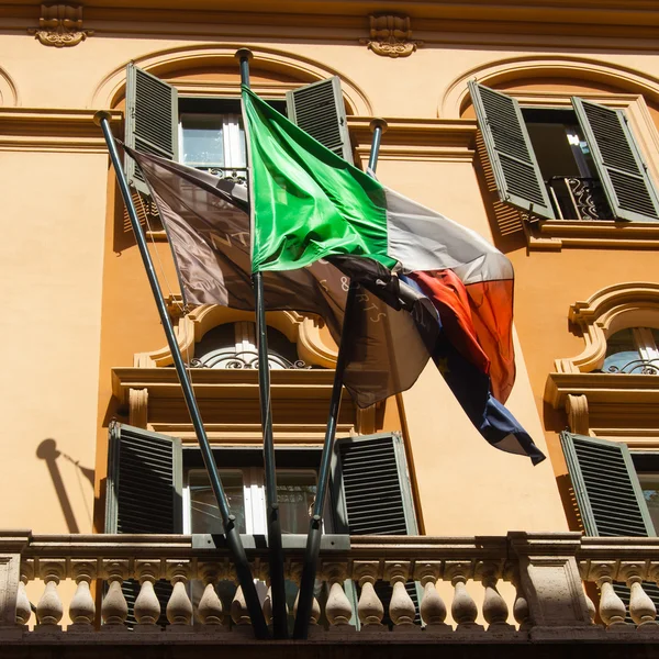 Vintage retro looking Italian flag on a old balcony with grunge