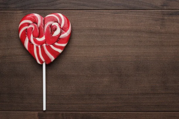 Red heart-shaped lollipop