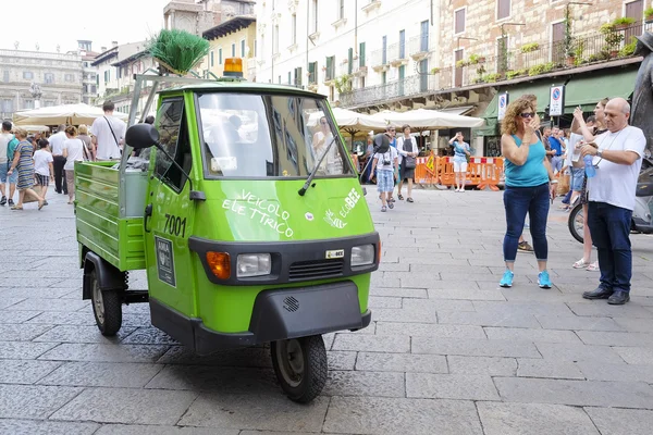 Street cleaning machine on a street of Verona