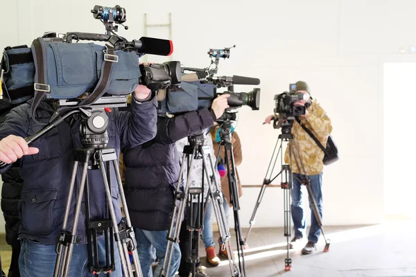 Journalists taking an interview