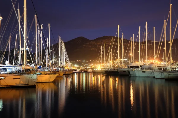 Image of white boats in a bay of Bar, Montenegro
