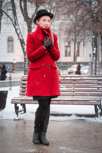 Girl in a red coat