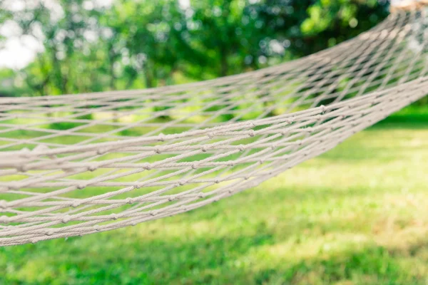 White hammock among the trees