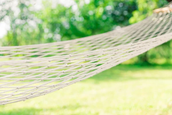 White hammock among the trees