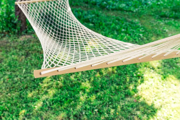 White hammock among the trees