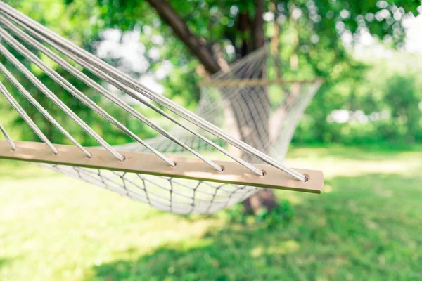 White hammock among the trees