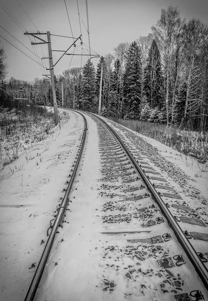 Snow covered railway crossing