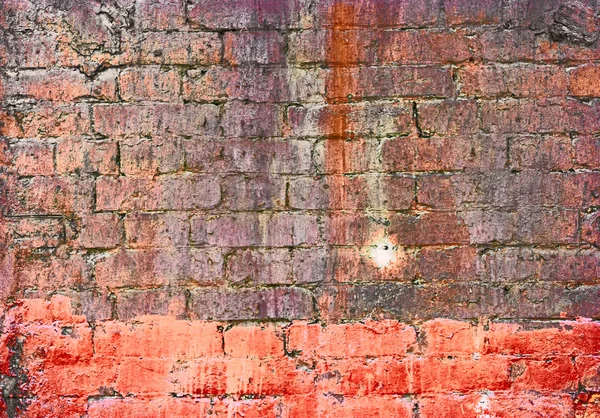 Weathered texture of stained old dark brown and red brick wall , grungy blocks of stone-work