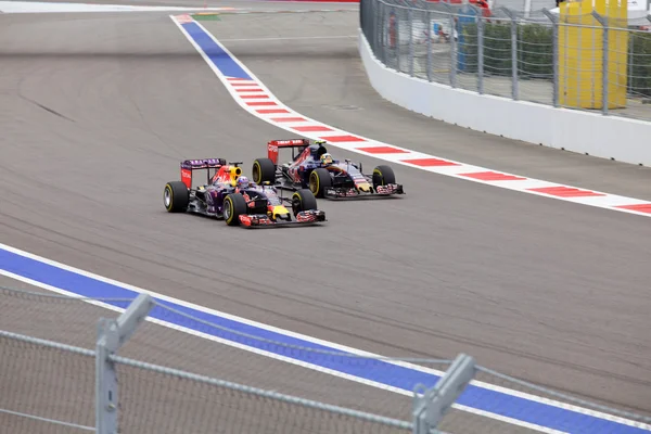 Daniel Ricciardo Red Bull Racing overtaking Carlos Sainz Toro Rosso