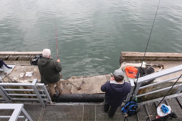 People fishing  in Palanga, Lithuania