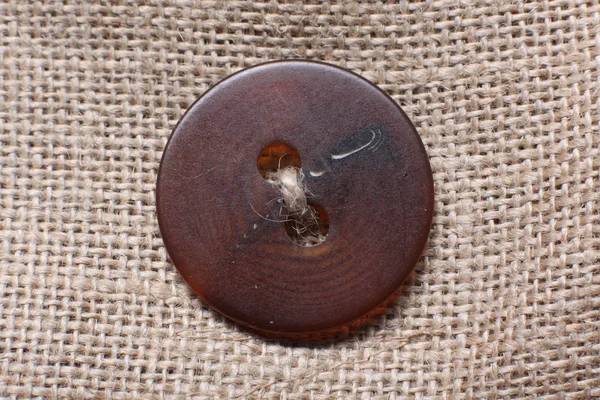 Dress button at Hessian sack
